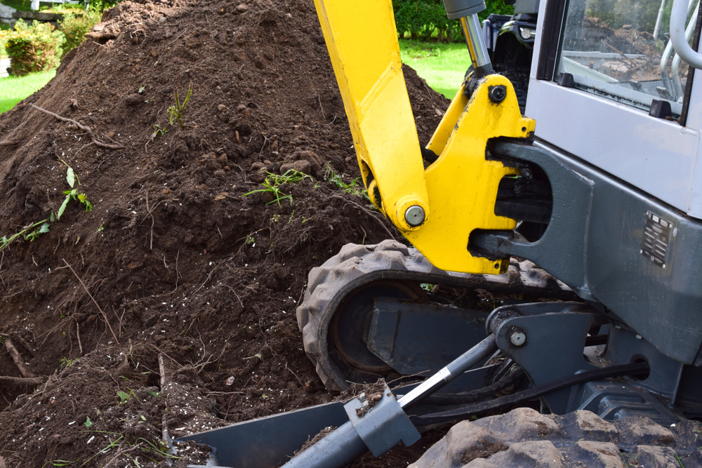 Mini,Excavator,Dug,Trench,In,The,Garden.,Works,On,Laying